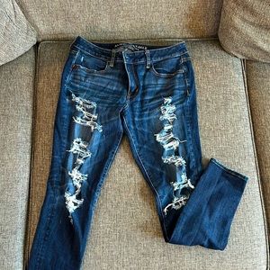 Dark wash ripped jeans/jeggings. Tight fit, super stretch, size 10